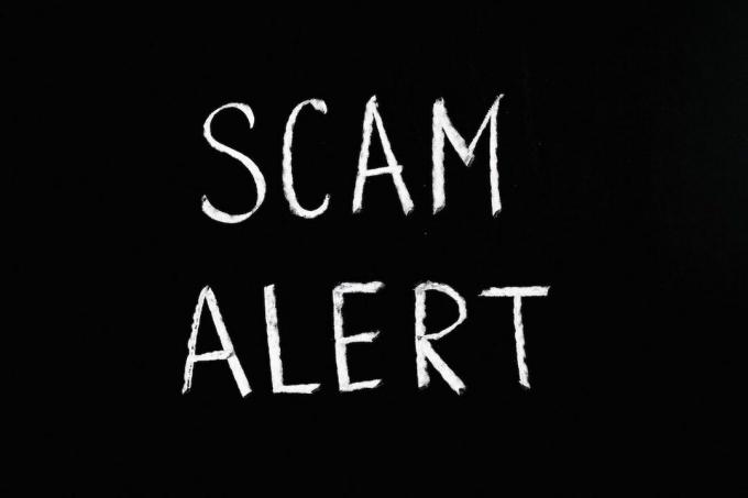 Foto af Text Saying Scam Alert